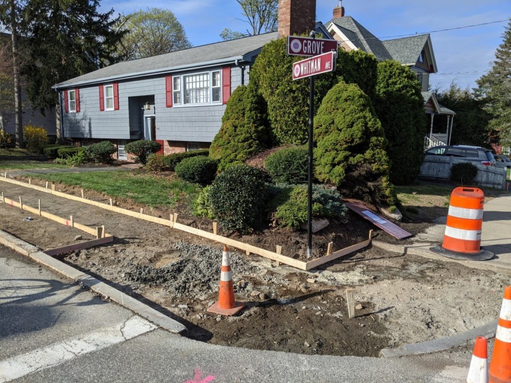 Sidewalks being placed at Whitman & Grove in Melrose, MA